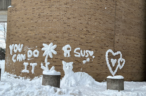 Snow art mural on the exterior of the Douglas Wright Engineering building, with the words &quot;you can do it&quot; clearly written.