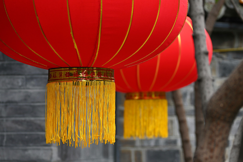 Traditional red lanterns with gold tassels.