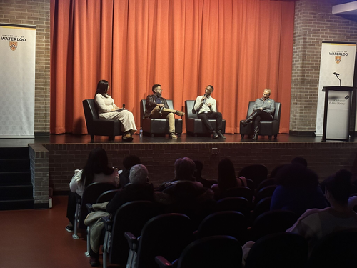 Aaron Francis, seated second from left, speaking on a panel at &quot;Inspiring Black Flourishing&quot; event at Kitchener Public Library, on February 13, 2024. 