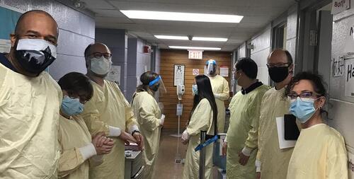 Optometry Clinic faculty and staff in full PPE gear.