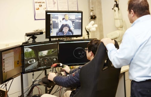 A driving simulator that features facial recognition.
