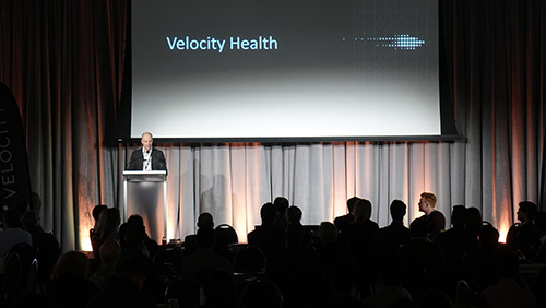 Adrian Cote speaking at the Velocity Health launch