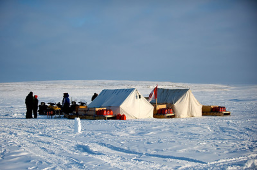 Canadian Rangers base in the Arctic with tents.