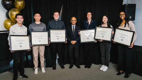 The co-op students of the year with their certificates, standing with President Vivek Goel.