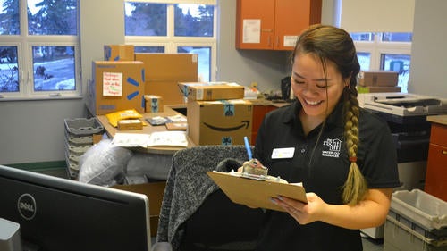 Student Amanda Truong at work in the Housing Office.