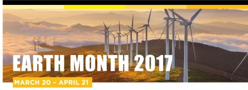 An Earth Month banner showing a field of wind turbines.
