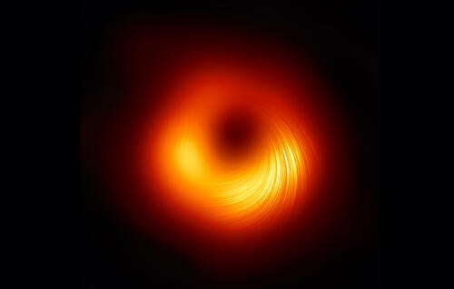 An image of a black hole with magnetic waves.