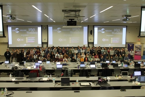 Participants in the LaTex workshop pose in a lecture hall.