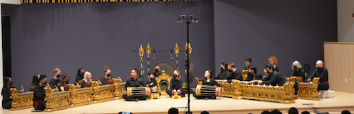 The Balinese Gamelan ensemble performs on stage.