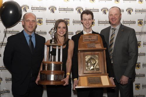 Warriors track athletes Tegan Sauer and Jörg Ahne with Athletics representatives and their awards.