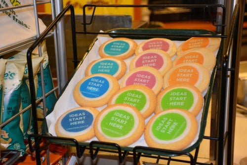 A rack of cookies with &quot;Ideas Start Here&quot; icing.