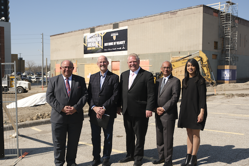 Kitchener Mayor Berry Vrbanovic, local entrepreneur, angel investor and community leader Mike Stork, Ontario Premier Doug Ford, president and vice-chancellor of the University of Waterloo Vivek Goel and Member of Parliament for Waterloo Bardish Chagger stand before the new Innovation Arena in downtown Kitchener.