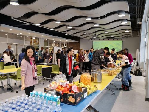 Students and volunteers at a wellness meal for international students.
