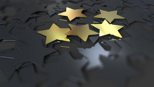 A collection of black and gold stars.