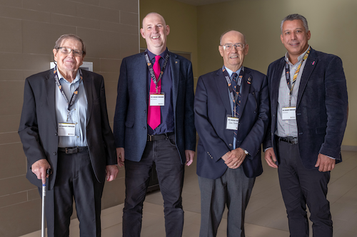 Paul Dirksen with Dean of Math Mark Giesbrecht, Don Cowan, and Raouf Boutaba at the 2022 Wes Graham Symposium.