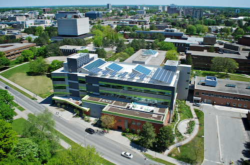 An aerial view of campus showing Environment 3's rooftop solar panels.