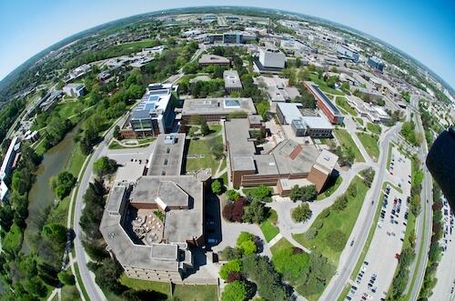 An aerial view of campus through a fish-eye lens.