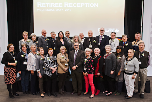 Retiree group photo at Federation Hall.