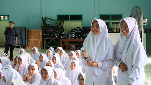 Girls take part in a mathematics outreach event in Indonesia.