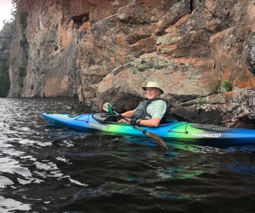 Dr. Craig Janes in a kayak.