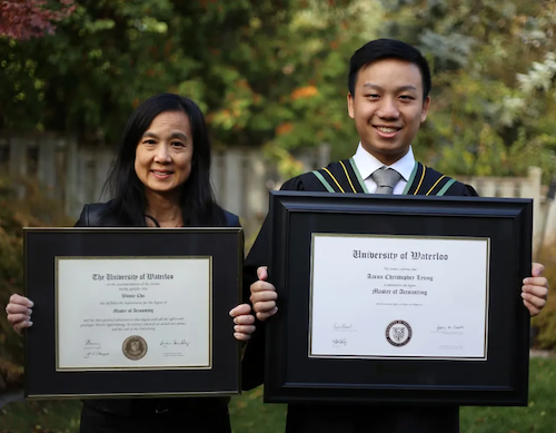 Winnie and Aaron Leung pose with their diplomas.
