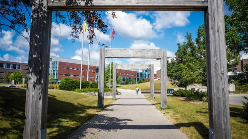 The view through the arches at the University's south campus entrance.