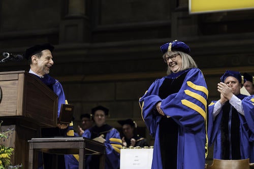 UR president Rich Feldman confers the Rochester Distinguished Scholar Award to Donna Strickland, Nobel Laureate and Professor of Physics, University of Waterloo. // University of Rochester Doctoral Degree Ceremony, Kodak Hall at Eastman Theatre May 18, 2019. // photo by J. Adam Fenster / University of Rochester