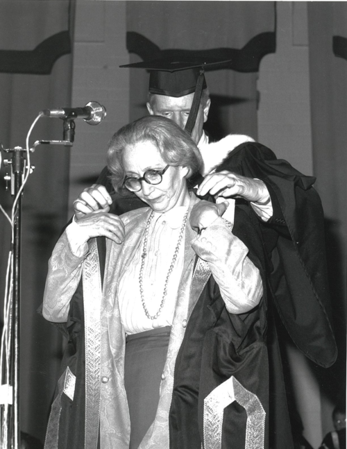 Sylvia Ostry dons her robes during her installation as Chancellor in 1991.