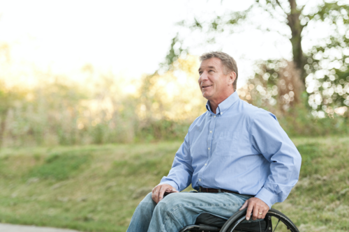 Rick Hansen sits in a wheelchair.