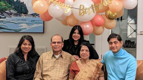 Members of the Varma family, including Nityanand (second from left), Shashi (second from right) and Amar (right) pose for a group shot.