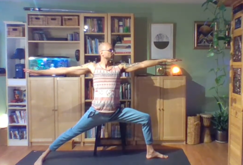 A yoga instructor strikes a pose.
