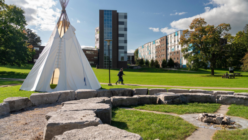 The teepee and ceremonial fire grounds at United College.