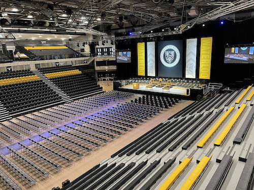 The Physical Activities Complex set up for Convocation ceremonies, with a stage and added seating.