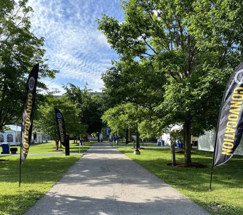 A University of Waterloo pathway marked with Convocation banners.