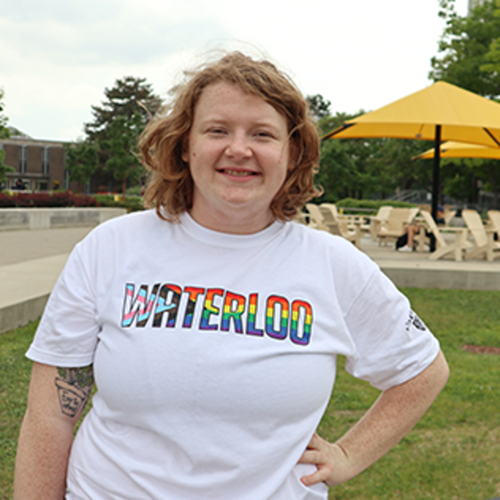 A person wears the Pride t-shirt.