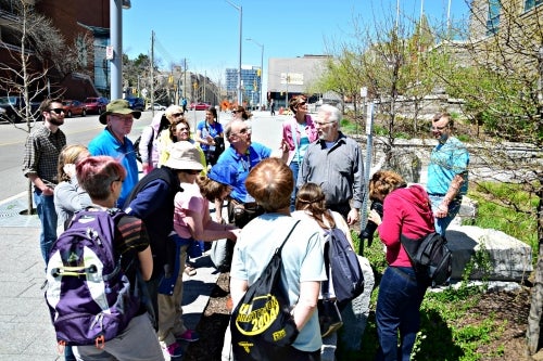 Peter Russell acts as a tour guide showing off Kitchener's rocks.