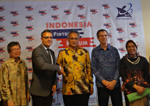Representatives from Indonesia's education ministry, Global Affairs Canada and the READI project celebrate the launch of the Ministerial Decree.