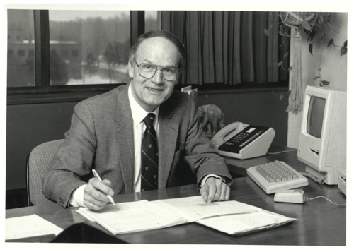 Vice-President, Academic Tom Brzustowski sits at his desk in Needles Hall in this 1985 photo.