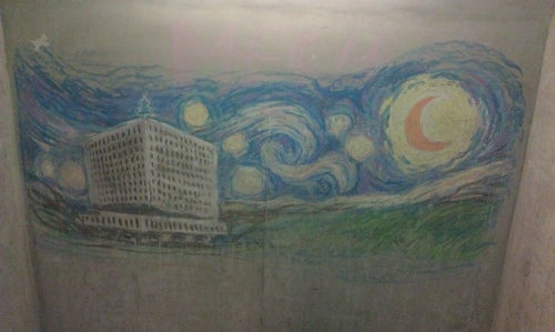 A chalk drawing showing Van Gogh's Starry Night and the Dana Porter Library.