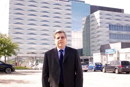 University Architect Daniel Parent stands in front of Engineering 5 and Engineering 7.