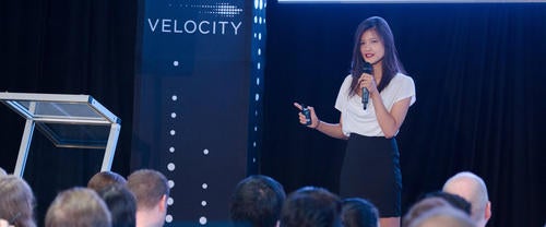 A woman speaks at the Velocity Fund finals.