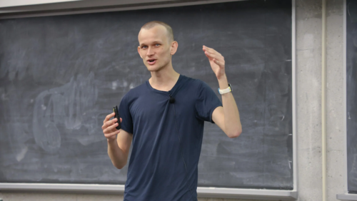Vitalik Buterin speaks to students at a public lecture.