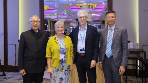 McCulloch with colleagues at the iCover 2024 conference in Hong Kong
