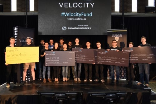 Velocity Fund winners with their oversized cheques.