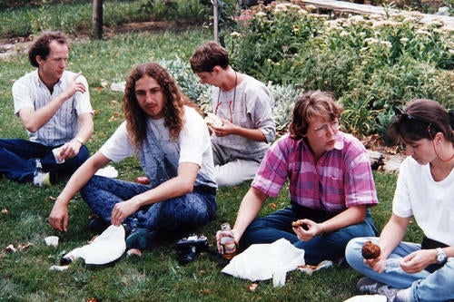A picnic during a field trip. At left is Professor Paul Parker, second from left is graduate student Lynne Elliott, centre front is graduate student Reinhold Posmyk, and Professor Jean Andrey (second from right) along with other colleagues.