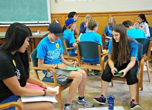 Campers at Conrad Grebel's Peace Camp engage in activities.