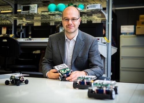 Sebastian Fischmeister poses in his lab at Waterloo Engineering.