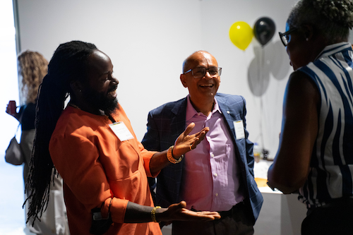 President Vivek Goel at the Black Excellence meet and greet with two professors.