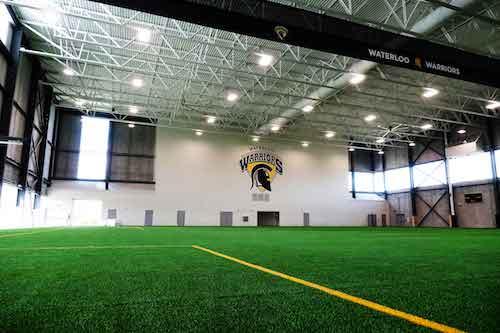 The interior of the CIF Field House showing the turf field.