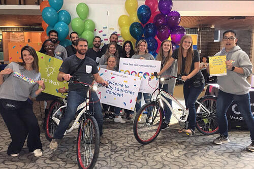 Team members celebrate the launch of Concept in 2019.